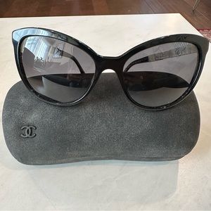 Chanel jeweled side frames.